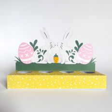 Easter egg stand with rabbits