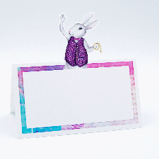 white rabbit place card with purple vest and blue-pink storybook border