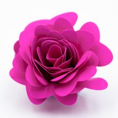 rolled paper flower with vivid pink heart-shaped petals
