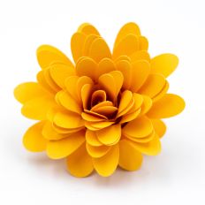 bright yellow rolled paper flower with long oval petals