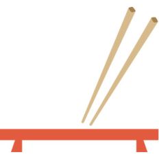 chopsticks and sushi board