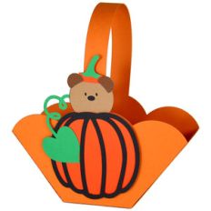 teddy in a pumpkin halloween basket