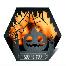 halloween shadow box with pumpkin and candles