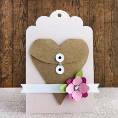 gift tag with a heart shaped string tie envelope