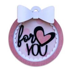 layered circle gift tag with a bow