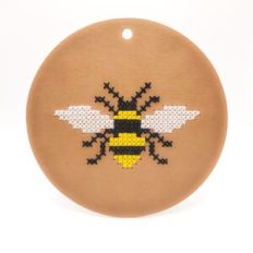 Circle with embroidered bee