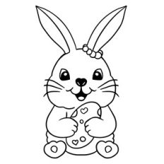 Cute baby Bunny holding Easter egg