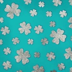 Embossed Teal with Silver Glitter Shamrocks Background Pattern