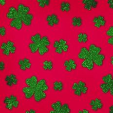 Embossed Red with Green Glitter Shamrocks Background Pattern