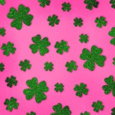 Embossed Pink with Green Glitter Shamrocks Background Pattern