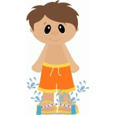 boy playing in sprinkler