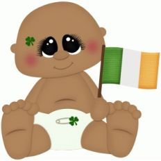 baby boy holding st. patricks flag