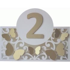 butterflies and flourishes table number card
