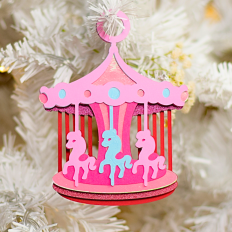This is a Merry-go-round paper craft ornament. It is made using multiple layers of colourful cardstock stacked on each other.