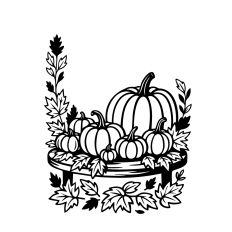 Pumpkins and leaves on table