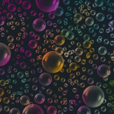 Black and Rainbow Bubble Background Pattern