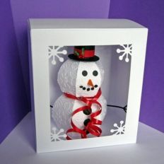 Snowman with box